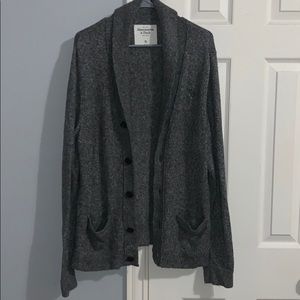 grey button up sweater